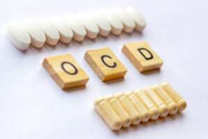 OCD text next to pills