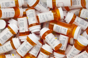 pile of prescription pill bottles