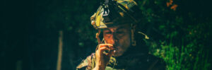 soldier smoking in camouflage uniform